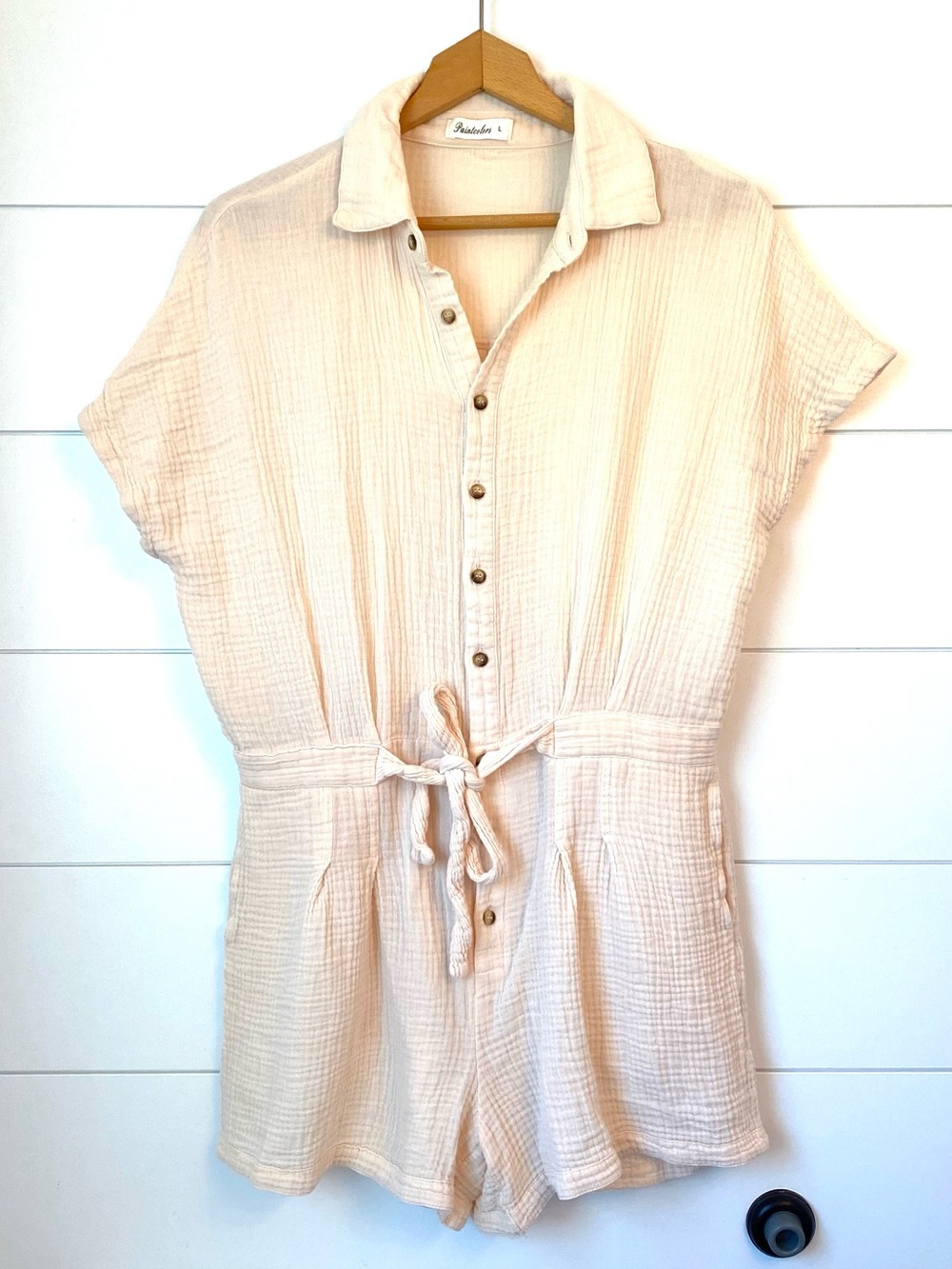 “Paintcolors” Casual Button-Front Cream Romper with Tie Waist. Size large.